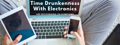 man looking at phone, tablet and computer at the same time